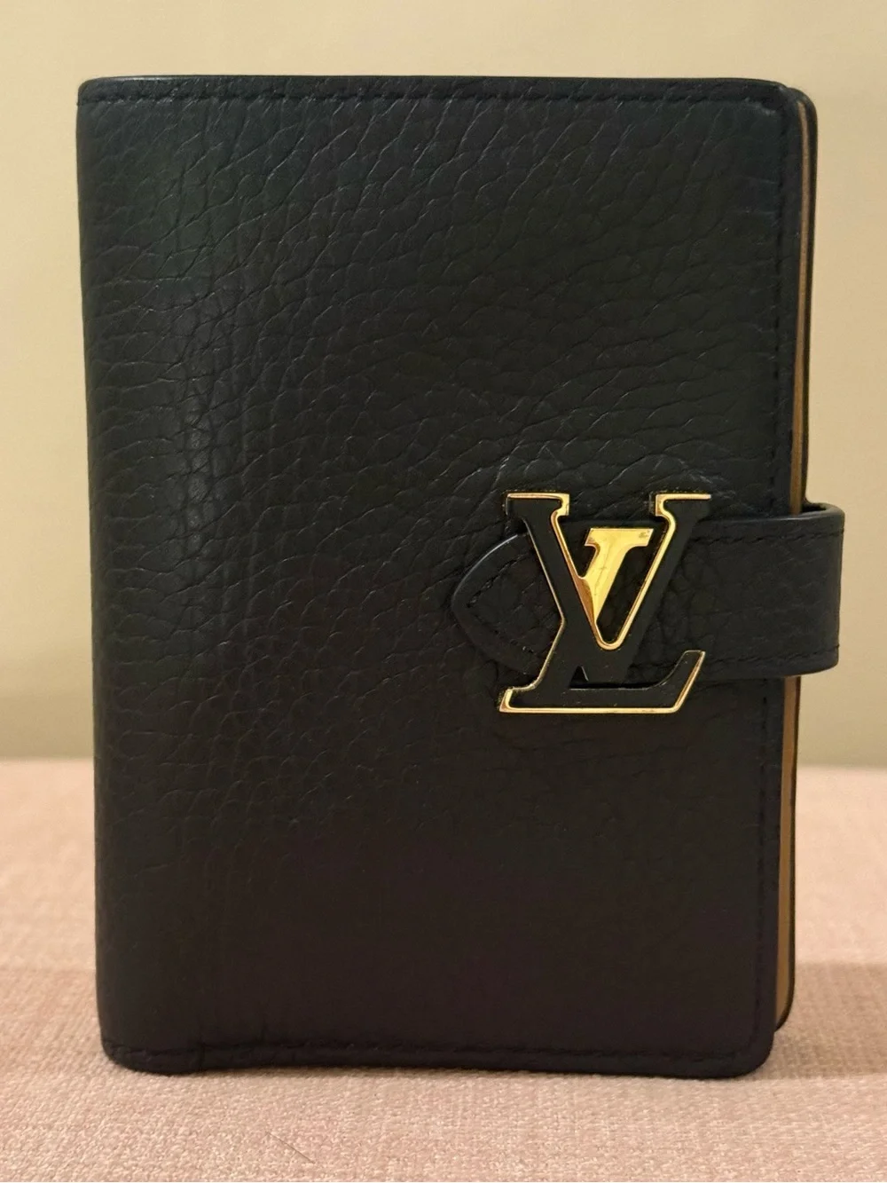 Louis Vuitton Black Leather Wallet with Gold LV Logo